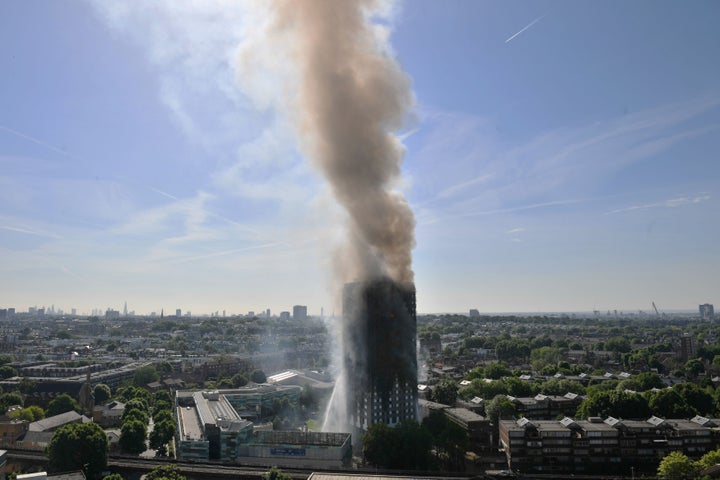 Smoke billows from a fire that has engulfed the 24-storey Grenfell Tower in west London.