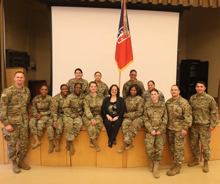Sarah Toce speaks at Washington state’s Fort Base Lewis-McChord, where transgender military members serve openly, during Wome