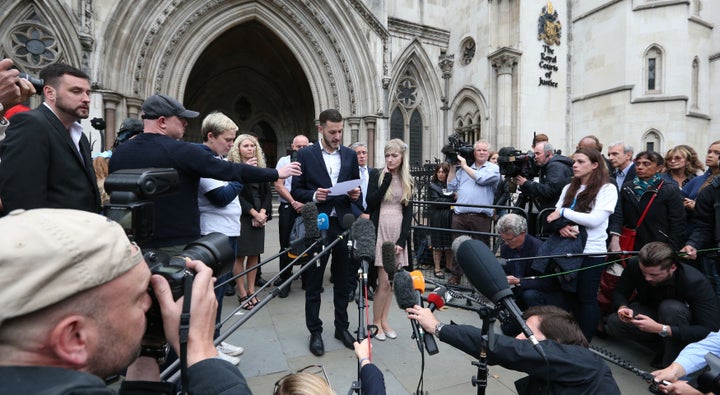 Chris Gard and Connie Yates speak to the media outside the High Court