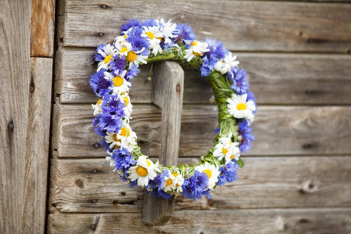 Greet your guests in style wi<a href="https://www.etsy.com/search?q=summer%20wreaths" target="_blank">th a summer wreath</a>.