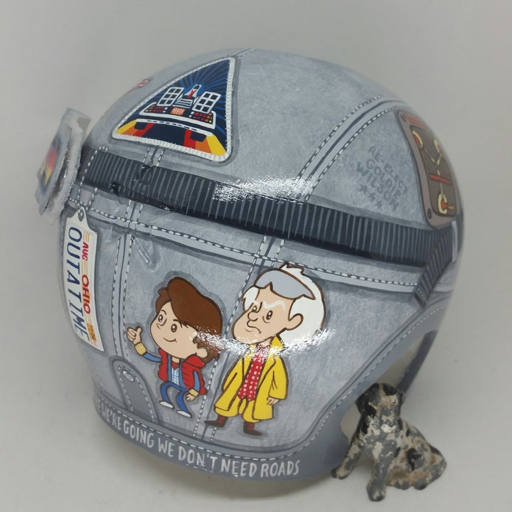 The helmet includes this fun cartoon of Marty McFly and Doc.