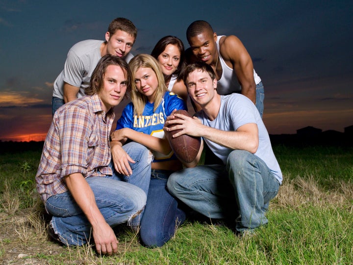 Back Row: Zach Gilford as Matt Saracen, Minka Kelly as Lyla Garrity, Gaius Charles as Brian 'Smash' Williams; Front Row: Tayl