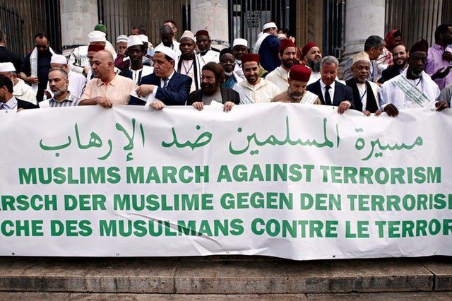 Participants of the Muslim March Against Terrorism demonstration pay tribute to the victims of terrorism in Brussels, Belgium on Jul. 10, 2017.