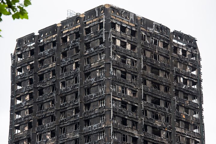 It will take at least 12 weeks to cover the burnt-out shell of Grenfell Tower, residents told.