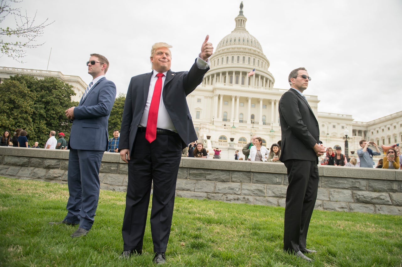 Anthony Atamanuik, playing Donald Trump, attends the Tax March rally on the west lawn of the Capitol in Washington, D.C., before a procession to call on Trump to release his tax returns on April 15, 2017.