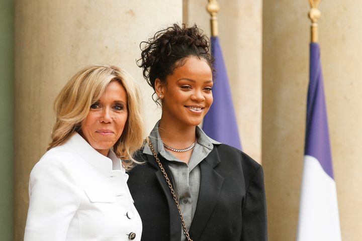 Brigitte Macron, wife of the French president, poses with musician and Global Ambassador for the Global Partnership for Education Rihanna as she welcomes her at the Elysee Palace in Paris on 26 July 2017. Rihanna is the founder of the Clara Lionel Foundation campaigning for education rights in impoverished communities worldwide.