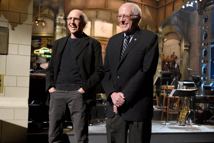 Larry David and Bernie Sanders (I-Vt.) stand side by side on the set of