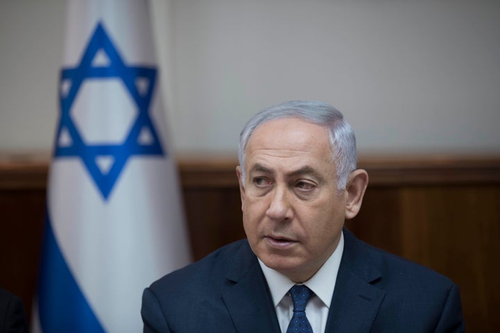 Israeli Prime Minister Benjamin Netanyahu attends the weekly cabinet meeting at his office in Jerusalem on July 23, 2017.