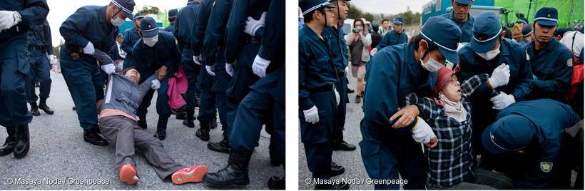 Okinawan protesters being removed by police.