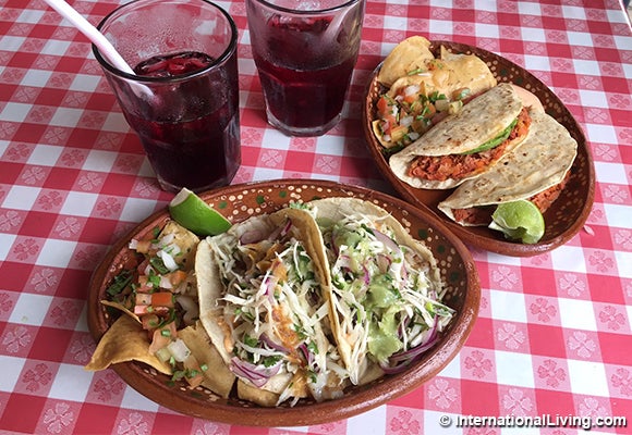 This meal, one plate of smoked marlin tacos and one plate of sea bass tacos, with two aguas de jamaica, cost us a total of just $8 at Lake Taco in Ajijic, Mexico. 