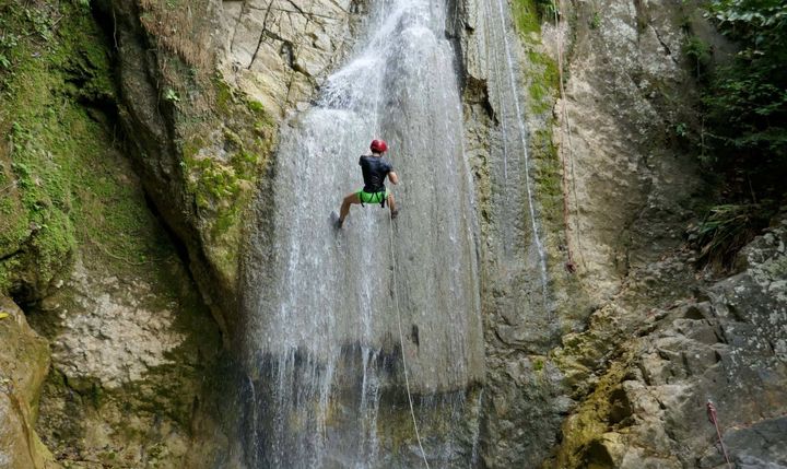 Stefan rappelling down the waterfall in Tobia town near Bogota