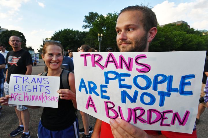 Protesters gather in front of the White House on July 26, 2017, in Washington, DC. Trump announced on July 26 that transgender people may not serve 'in any capacity' in the US military, citing the 'tremendous medical costs and disruption' their presence would cause. 