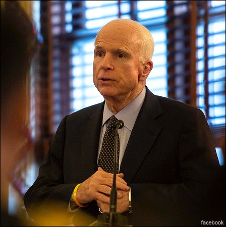 McCain returns home for cancer treatment