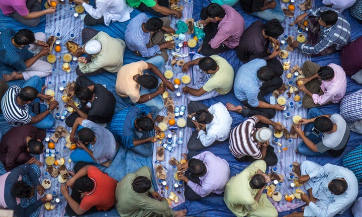 Muslims eat an evening meal called iftar after the sun sets during Ramadan.