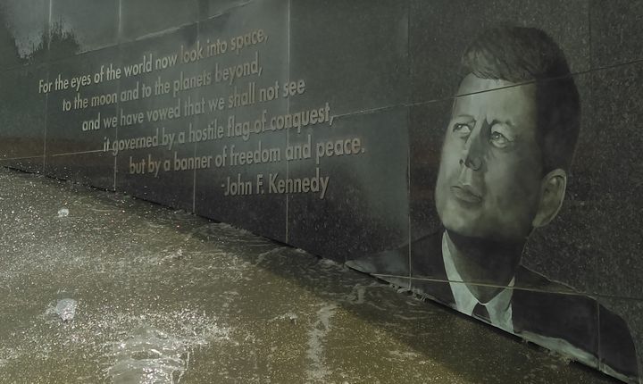 Image of Kennedy at the Kennedy Space Center, calling for the moon and planets beyond to have “a banner of freedom and peace.”