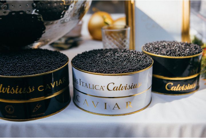Calvisius Caviar at the Champagne Taittinger Presents: The Art of Celebrating The Holidays III on July 17, where guests were told to eat caviar off the back of their hand.