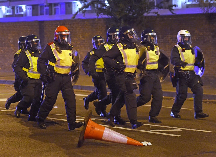 Riot police at the protest in Kingsland Road