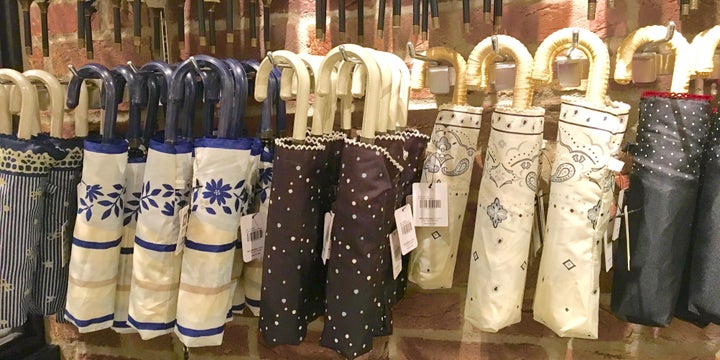 <p>A display of rain/shine folding parasols at The Awesome Store (yes, that is it’s name) for 980 yen. </p>