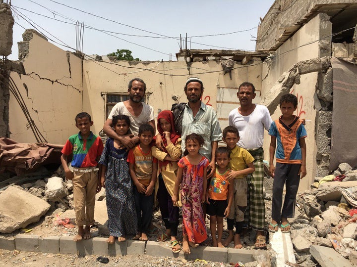<p>Aden Yemen - “The Awal family in the wreckage of their home - hit by two Saudi air strikes. Some of them still live in the ruins.” Courtesy: BBC, Orla Guerin. </p>