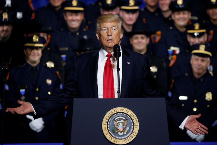 President Donald Trump delivers remarks about his proposed U.S. government effort against the street gang Mara Salvatrucha, or MS-13, to a gathering of federal, state and local law enforcement officials in Brentwood, New York on July 28.