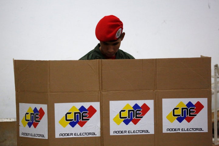 A soldier casts his ballot during the Constituent Assembly election in Caracas, Venezuela, July 30, 2017. 