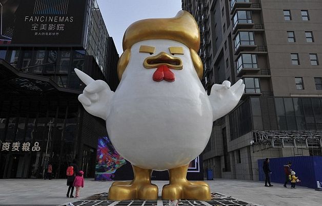 <p>A 23-foot high blow-up sculpture celebrating the Year of the Rooster at a shopping mall in Taiyuan in China’s northern Shanxi Province. </p>
