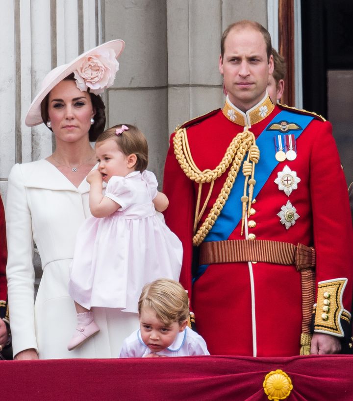 Catherine, Duchess of Cambridge, Princess Charlotte, Prince George, Prince William, Duke of Cambridge stand on the balcony during the Trooping the Colour, this year marking the Queen's official 90th birthday at The Mall on June 11, 2016 in London, England. 