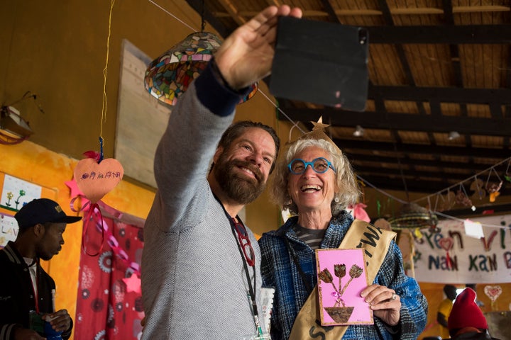 Martin Brouillette and Dr. Jane Aronson pose for a selfie in Martin’s art workshop, Kan Etwal, Kenscoff, Haiti. 