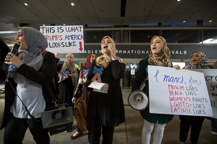 Women demonstrate in support of a ruling by a federal judge in Seattle that grants a nationwide temporary restraining order against the presidential order to ban travel to the United States from seven Muslim-majority countries, at Tom Bradley International Terminal at Los Angeles International Airport on February 4, 2017 in Los Angeles, California.