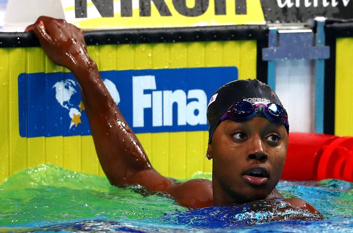 Simone Manuel of the United States celebrates after winning the gold medal during the Women's 100m Freestyle final on day fifteen of the Budapest 2017 FINA World Championships on July 28, 2017 in Budapest, Hungary. 