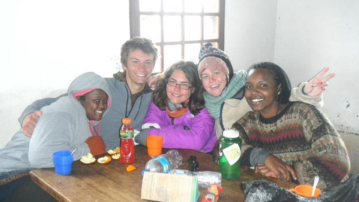 Nathan and other Global Citizen Year Fellows huddling for warmth in the Chimborazzo refuge at 4800 meters.