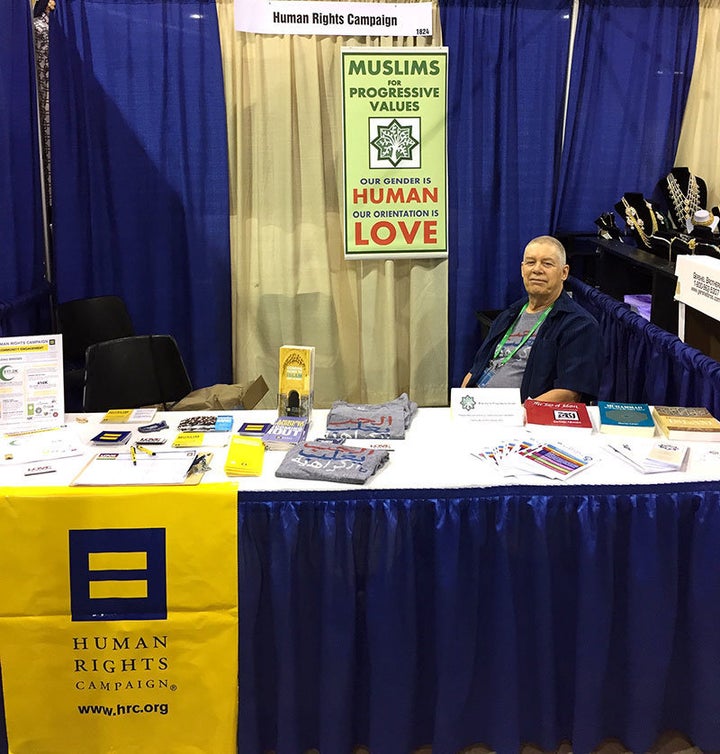 Frank Parmir, founder of MPV-Columbus, managing a booth organized by Muslims for Progressive Values and the Human Rights Camp