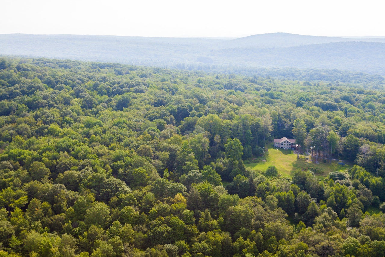 A HuffPost reporter joined two Conservation Fund officials as they surveyed the new property from the air on a commissioned helicopter.
