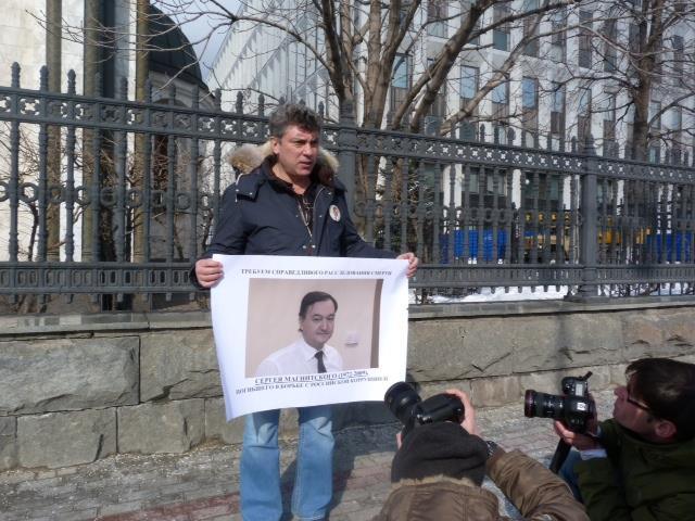 Protesting the death in prison of Russian lawyer Sergei Magnitsky which led to US sanctions against Russia.