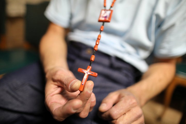 Mexican migrant Jose Angel Garcia, 42, holds a crucifix he made as he waits at the Juan Bosco migrant shelter after being deported from the U.S. following two years in an immigration detention center, in Nogales, Sonora, Mexico, February 1, 2017.