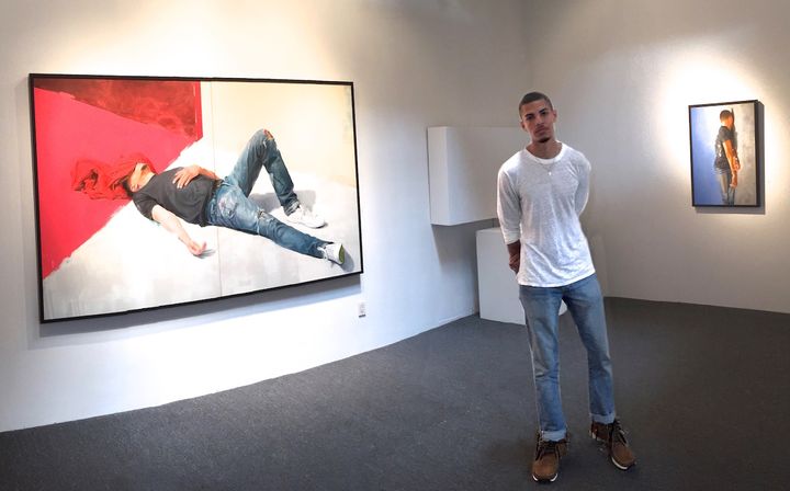 Painter Delfin Finley at his exhibition at Lora Schlesinger Gallery. Photo by Edward Goldman. 