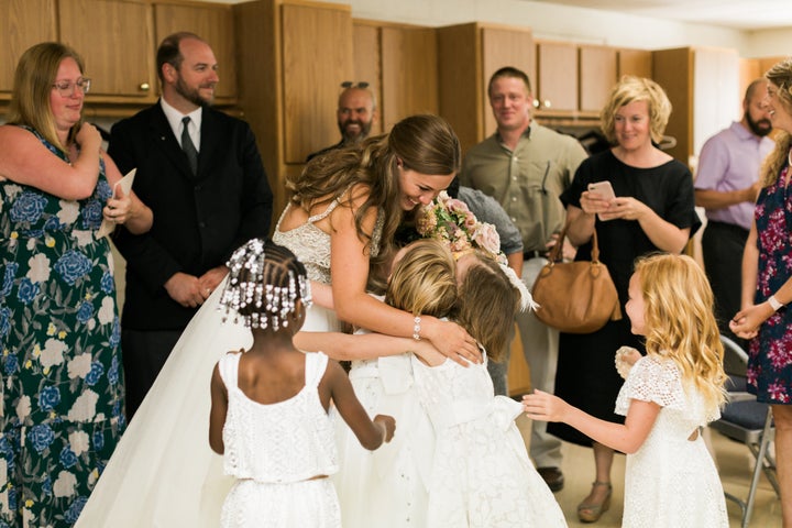 The bride teaches a kindergarten/first grade combination class. "Half of the students I have had in my class for two years and the other half I have again this year," she explained. 