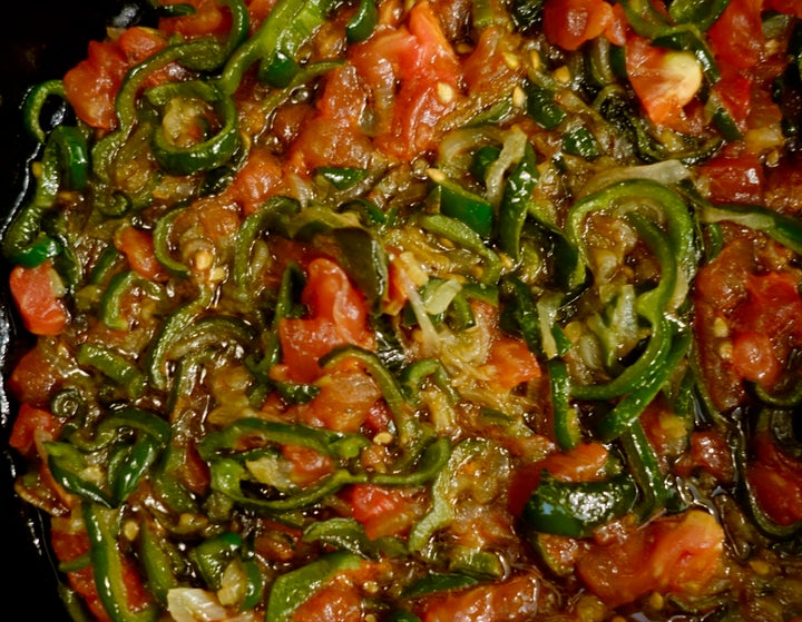 <p>Then the tomato is cooked down for a couple of minutes</p>