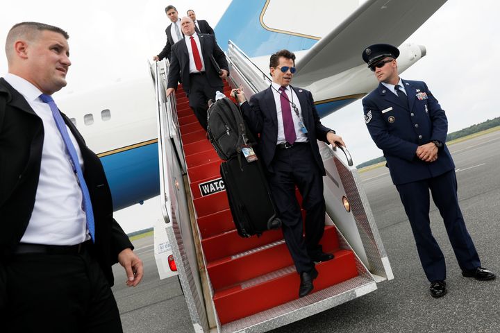 White House communications director Anthony Scaramucci arrives with President Donald Trump aboard Air Force One in Ronkonkoma, New York, on Friday. On Monday, Scaramucci was out of a job. 