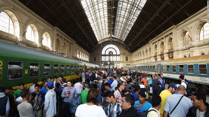 <p>Migrants at the railway station in Hungary </p>
