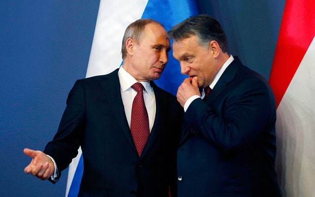 <p>Vladimir Putin with Viktor Orban in discussion in budapest</p>
