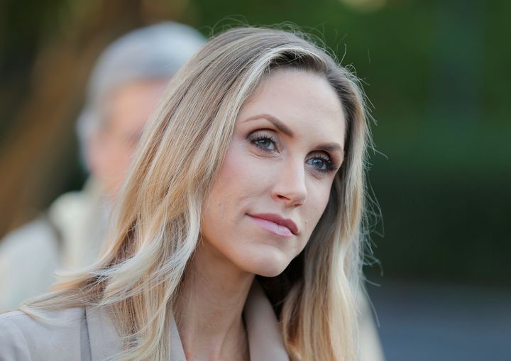 Lara Trump listens as her husband, Eric Trump, gave a speech during last year's campaign.