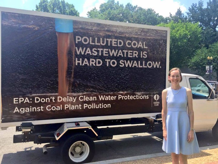 Mary Anne Hitt in front of the mobile billboard at the EPA headquarters in Washington, DC, on the day of the hearing.