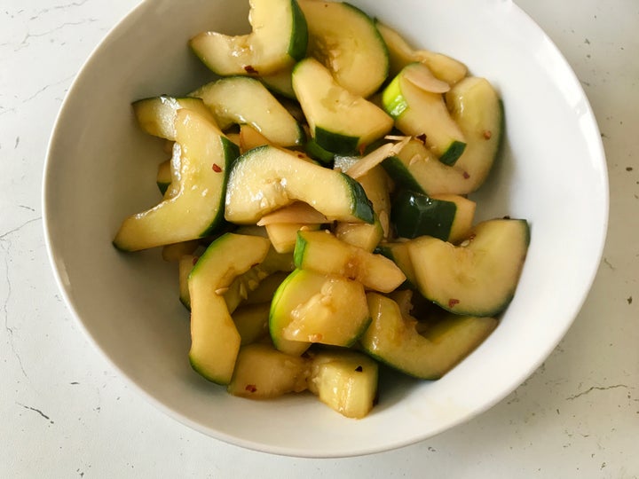 A bowl of piping-hot cucumber sautéed in soy sauce, garlic and chili flakes. We promise it tastes way better than it sounds.