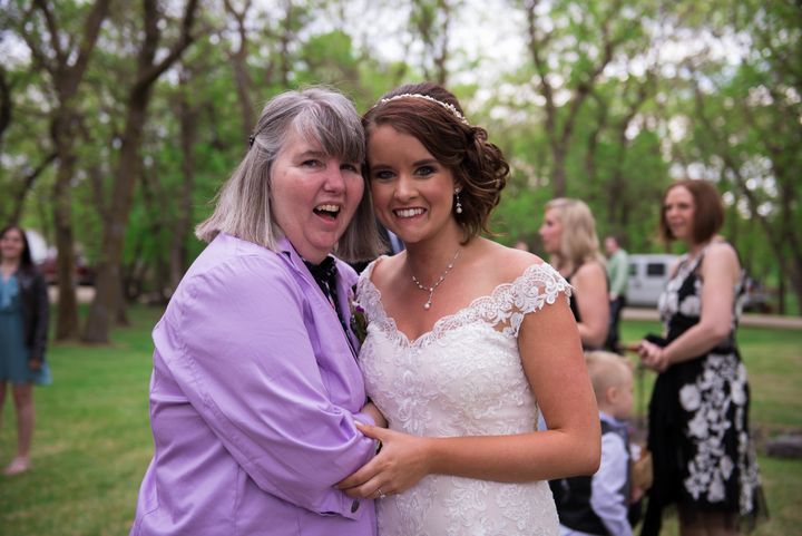 Stephanie Gefroh poses with her mom on her wedding day.