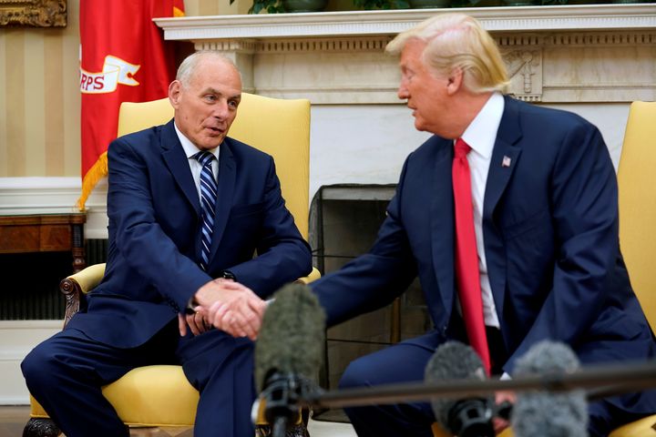 White House chief of staff John Kelly shakes hands with President Donald Trump after being sworn in on Monday for his new role.