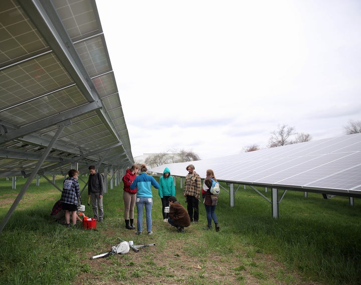 Hampshire students and faculty begin research on 19 acres of solar-array fields on campus as the college goes 100% solar for electricity this year. 