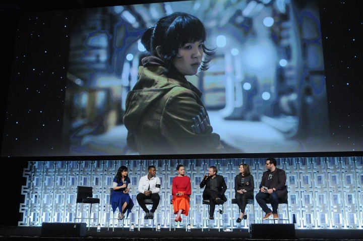 Kelly Marie Tran, John Boyega, Daisy Ridley, Rian Johnson, Kathleen Kennedy and Josh Gad attend a "Star Wars: The Last Jedi" panel at the 2017 Star Wars Celebration in Orlando, Florida, on April 14.