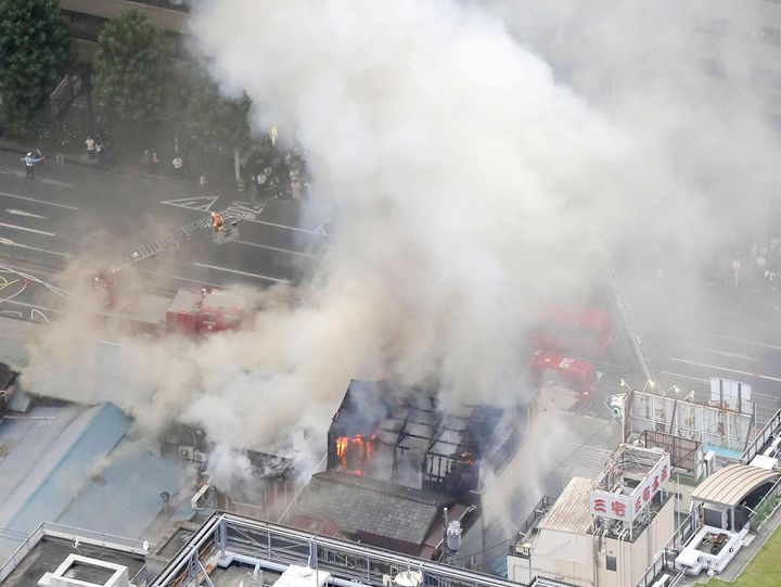 An aerial view shows smoke spewing from the fire at the Tsukiji fish market in Tokyo, Japan, on Thursday.