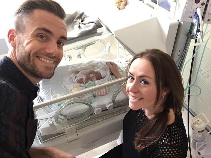 John Calder and Lorna Carmichael with their daughter Chloe Filipa Grace Calder at St George’s Hospital in London.